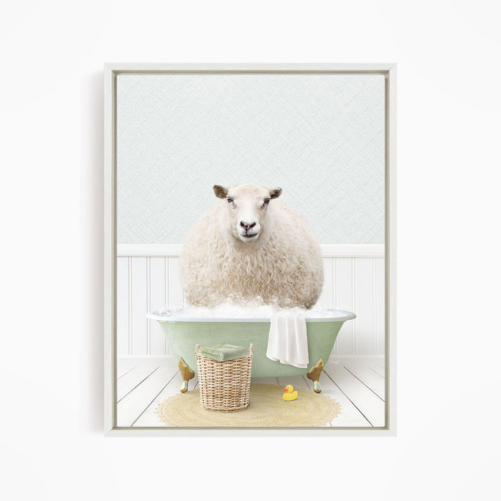 A fluffy white sheep sits in a green bathtub filled with bubbles, surrounded by a yellow rubber duck and a wicker basket.