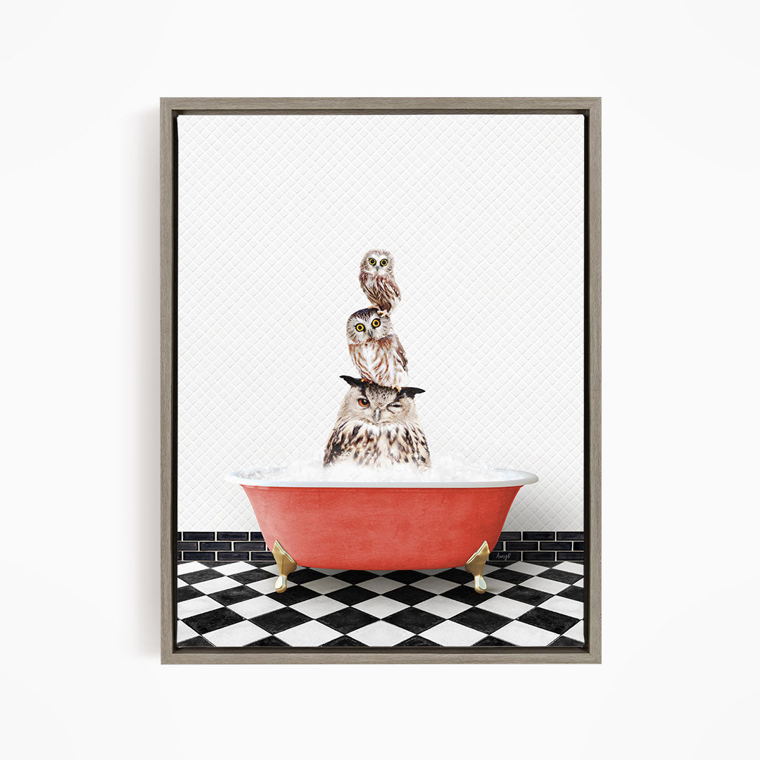 A framed image depicting a group of owls sitting in a red bathtub, with a black and white checkered floor beneath them.