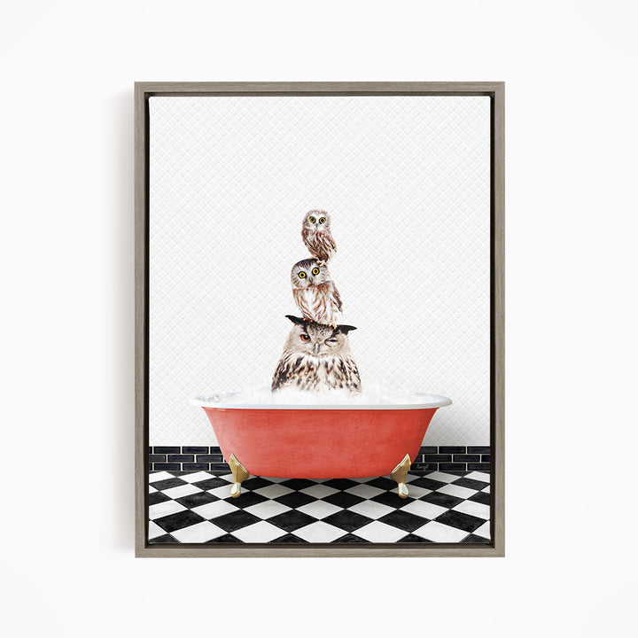 A framed image depicting a group of owls sitting in a red bathtub, with a black and white checkered floor beneath them.