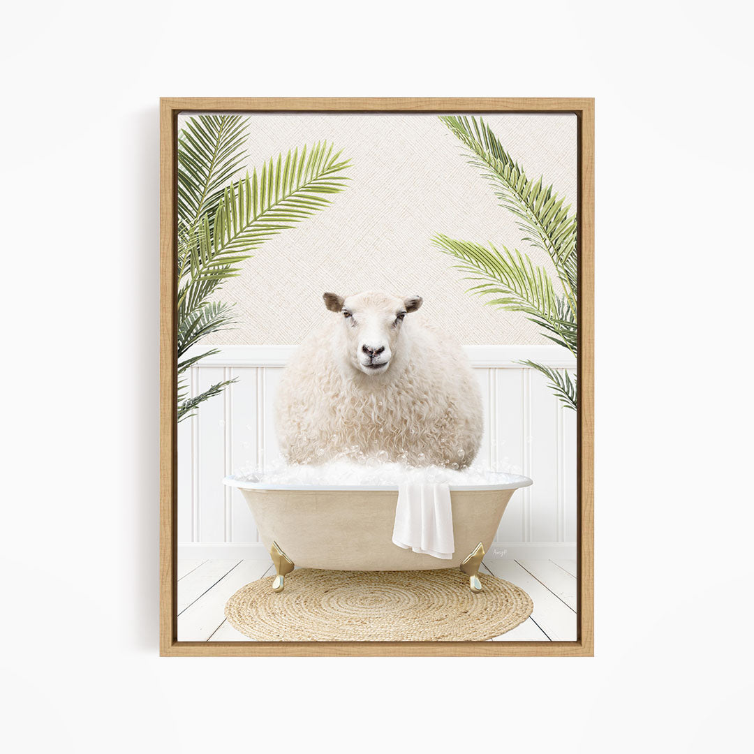 A fluffy white sheep sits in a bathtub filled with bubbles, surrounded by lush green palm leaves.