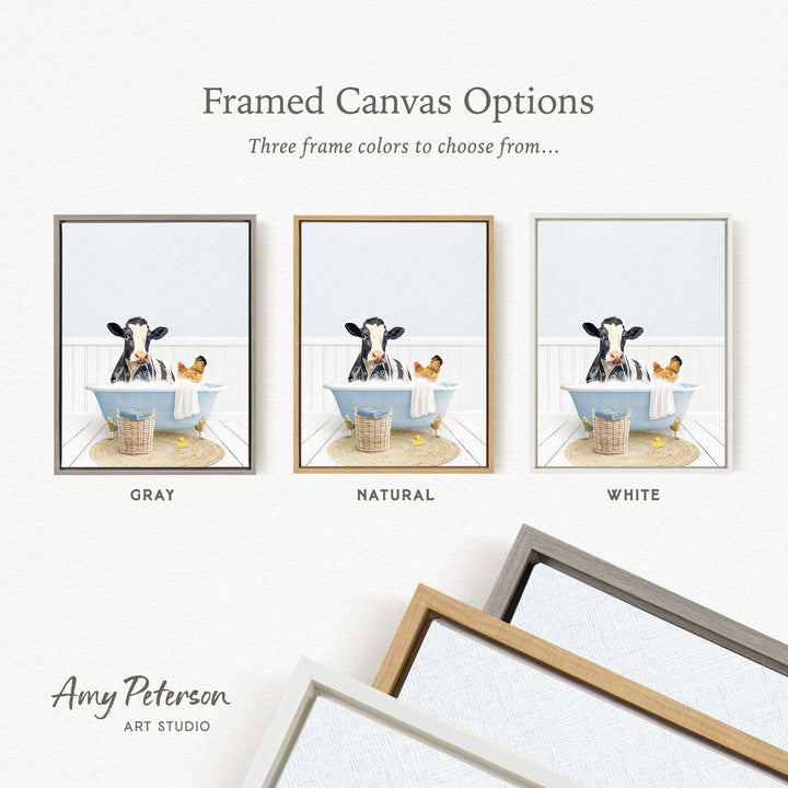The image is a framed canvas option featuring three different color options for a painting of a cow in a bathtub, with a chicken and a basket nearby.