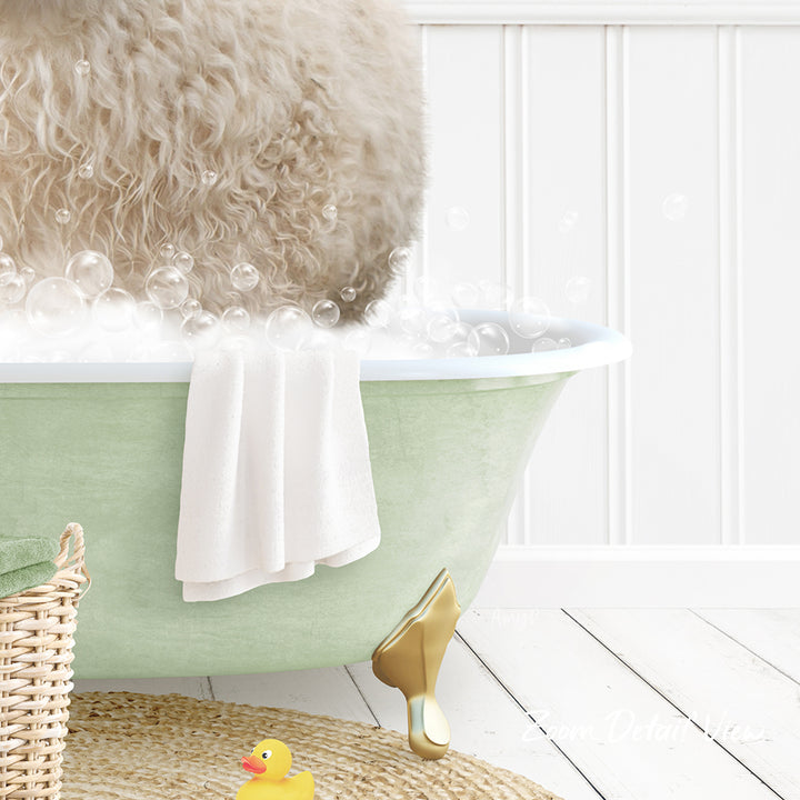 A fluffy white dog is sitting in a green bathtub filled with bubbles, with a towel and a rubber duck nearby.