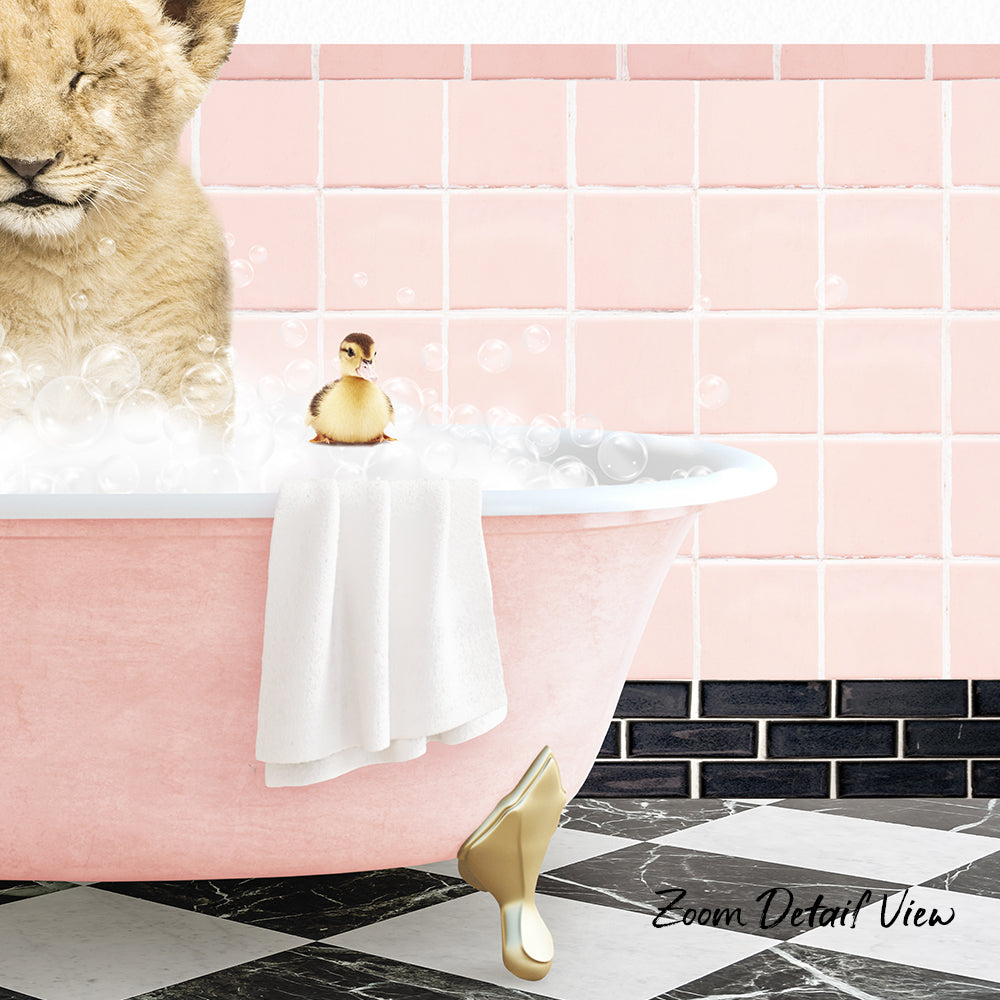 A pink bathtub filled with bubbles, with a small yellow duck sitting on a towel and a gold shoe placed on the edge of the tub.