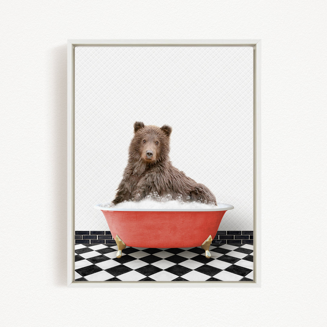 A brown bear sitting in a red bathtub filled with bubbles, with a black and white checkered floor in the background.
