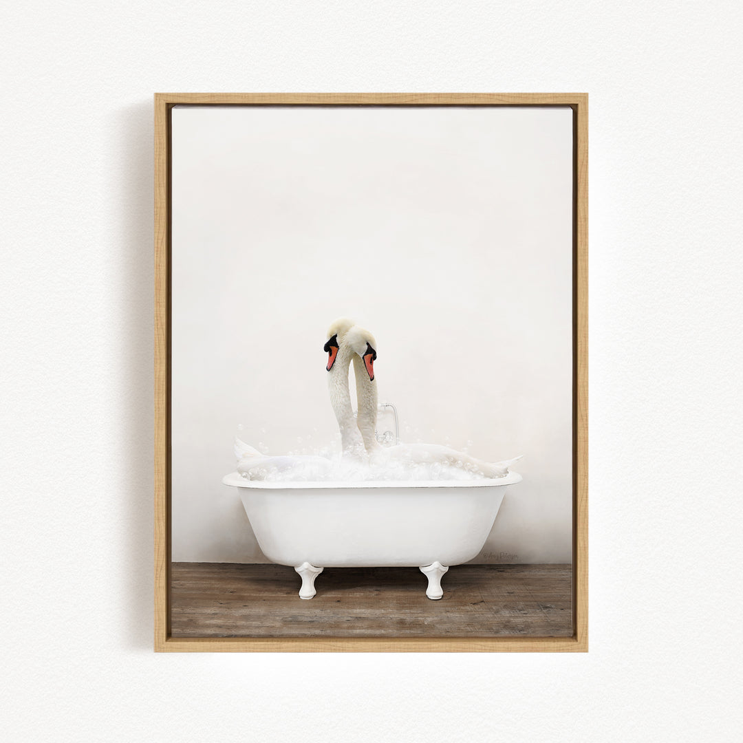 A pair of swans standing in a white bathtub filled with water, creating a serene and peaceful scene.