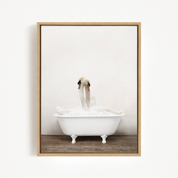 A pair of swans standing in a white bathtub filled with water, creating a serene and peaceful scene.