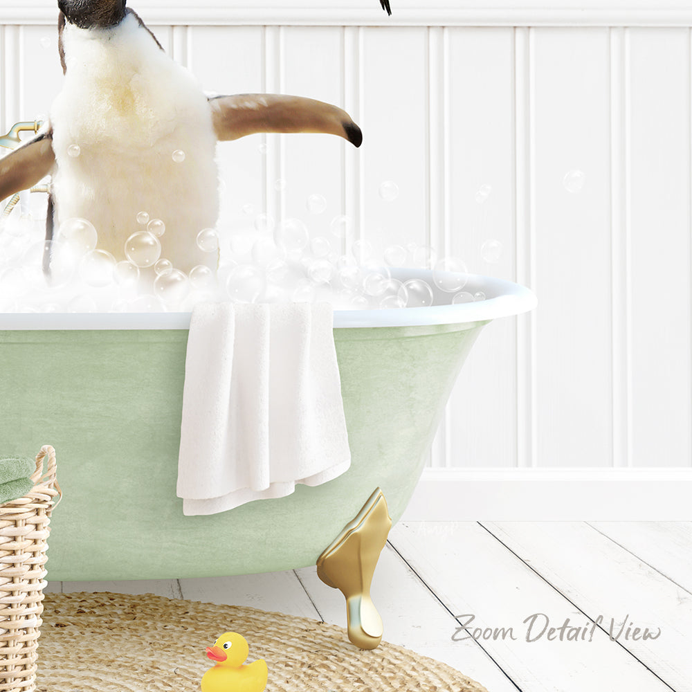 A penguin standing in a green bathtub filled with bubbles, surrounded by a yellow rubber duck and a white towel.