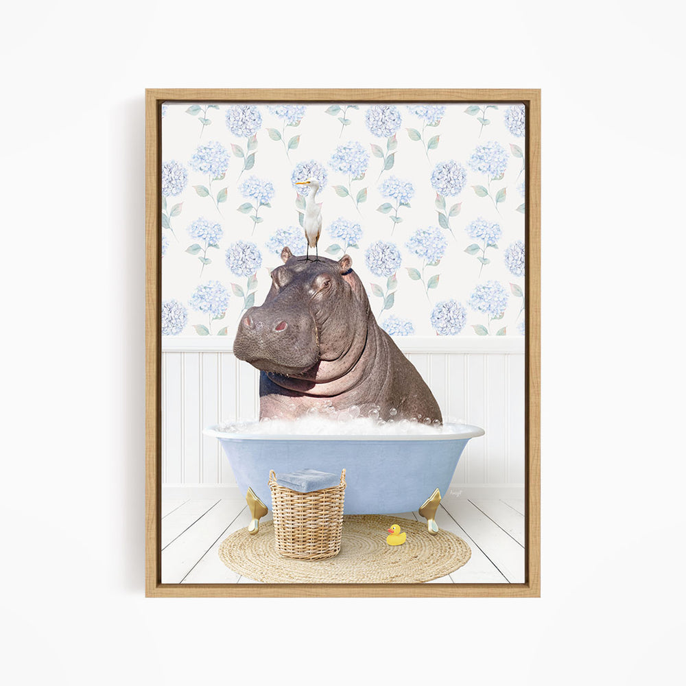 A hippopotamus sitting in a bathtub, with a bird perched on its head, and a basket of rubber ducks nearby.