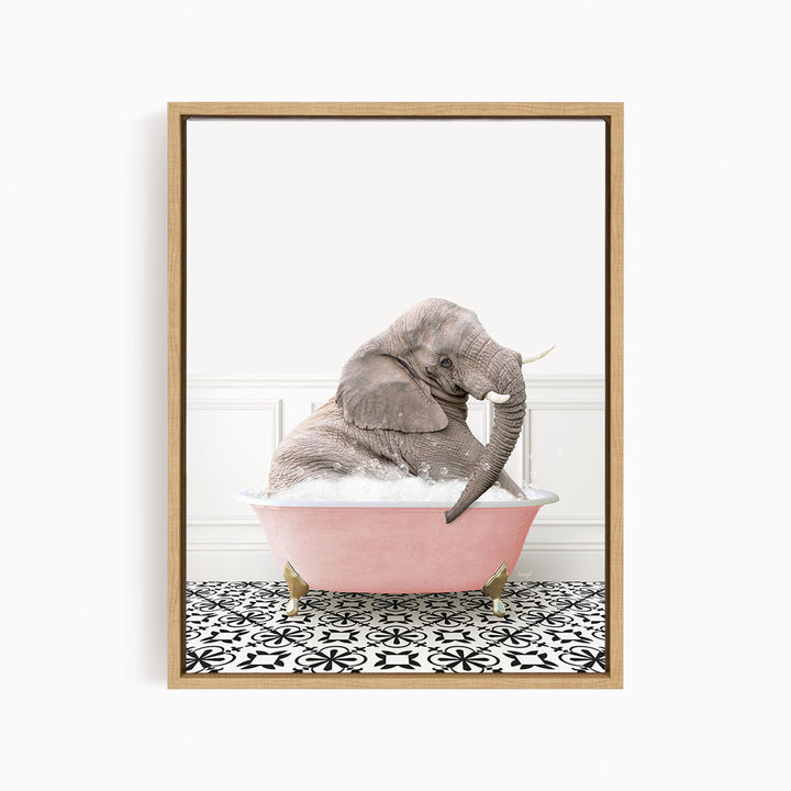 A gray elephant is sitting in a pink bathtub filled with water, surrounded by a black and white patterned floor.