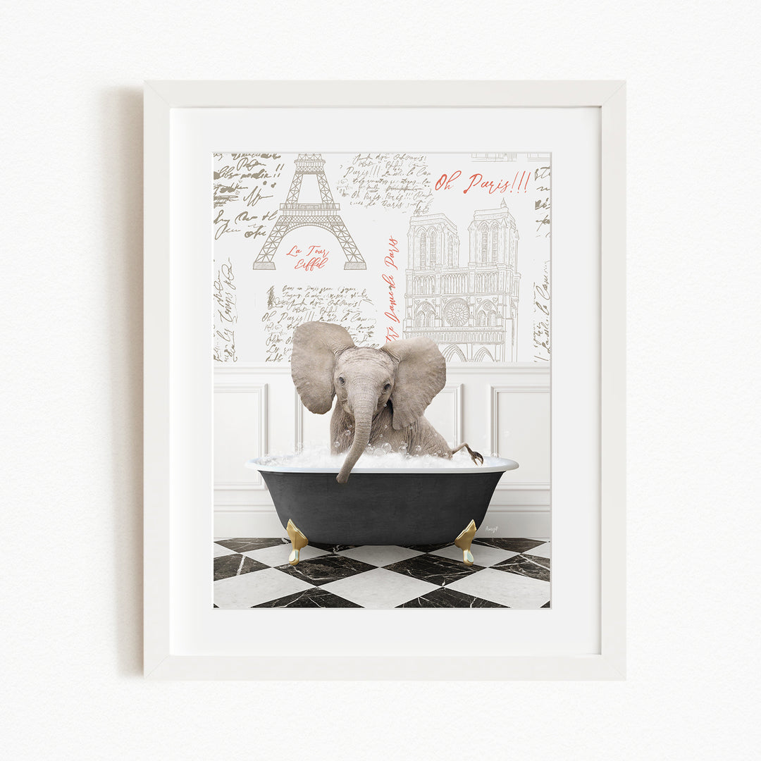 A framed image depicting an elephant sitting in a bathtub, with a Paris-themed background featuring the Eiffel Tower and other Parisian landmarks.