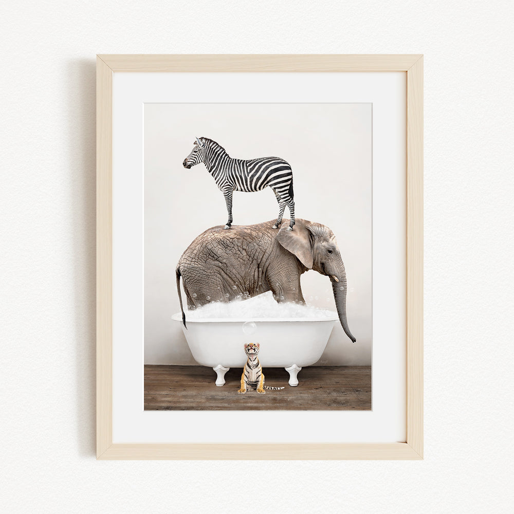 A zebra stands on top of an elephant in a bathtub, with a tiger sitting on the edge of the tub.