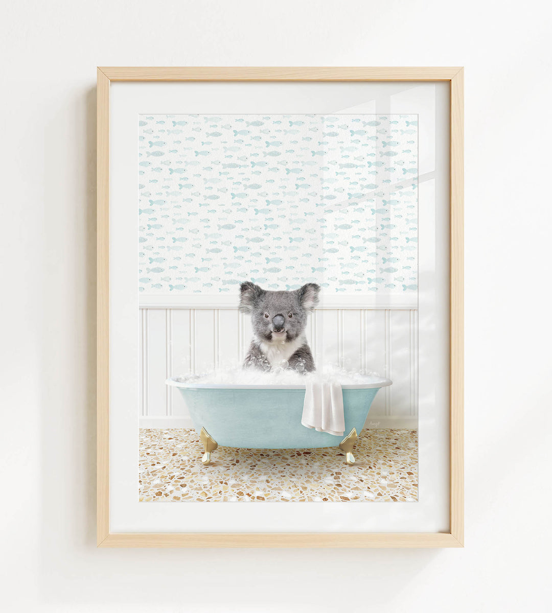 A koala bear sitting in a blue bathtub filled with bubbles, surrounded by a patterned wall and a beige floor.