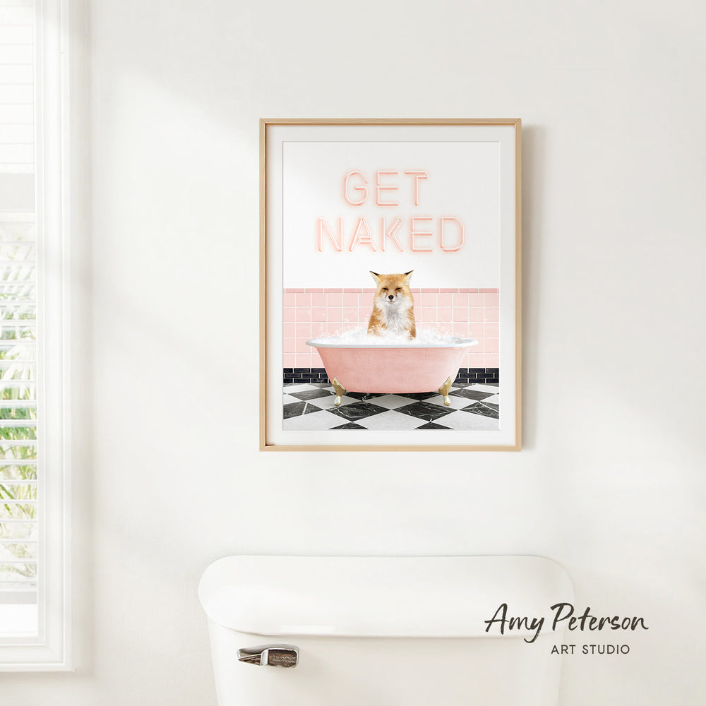A framed poster with the text "GET NAKED" and an image of a cat sitting in a pink bathtub.