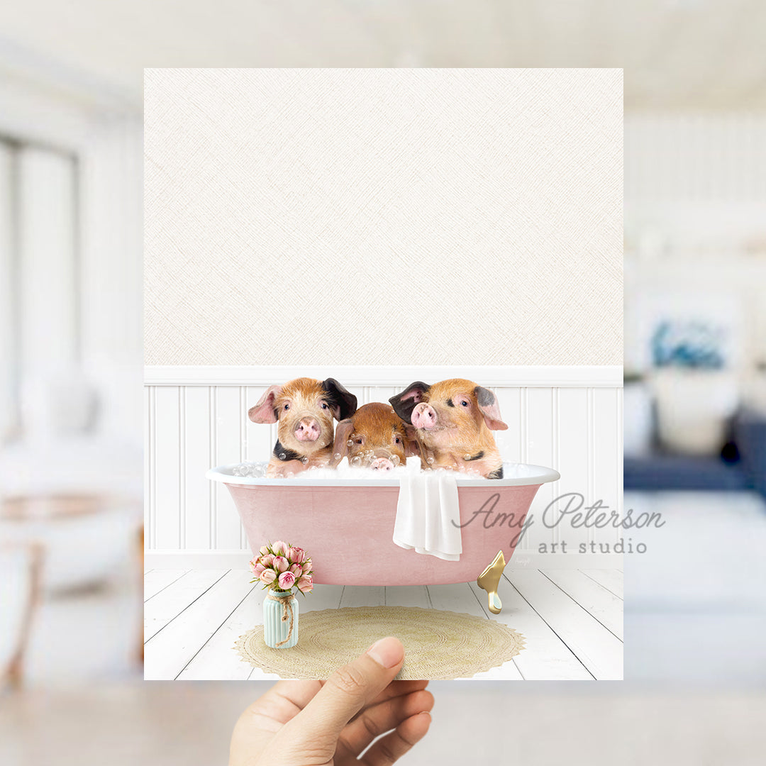 a hand holding a card with three puppies in a bathtub