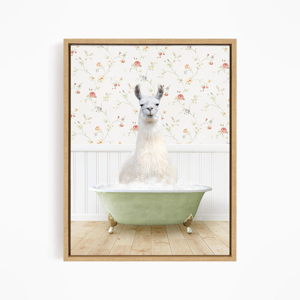 A white llama sitting in a green bathtub filled with bubbles, with a floral wallpaper in the background.