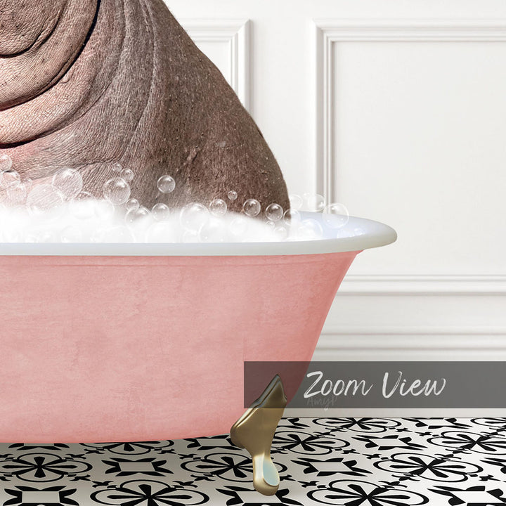 A pink bathtub filled with bubbles, with a gold faucet and a gold hairbrush placed inside the tub.