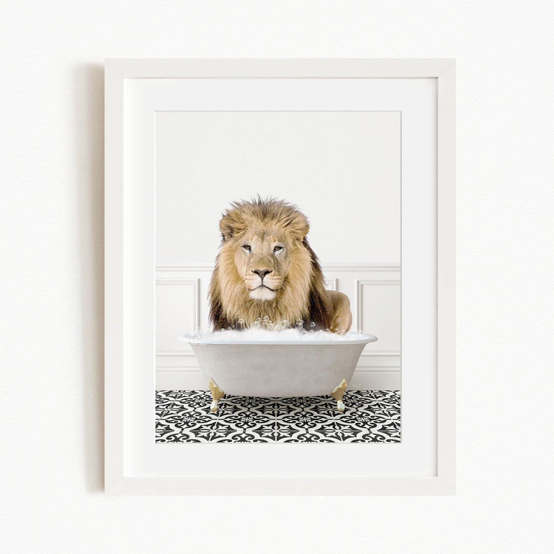 A lion sitting in a white bathtub filled with bubbles, surrounded by a black and white patterned floor.