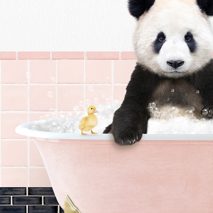 a panda bear in a bathtub with bubbles and a rubber duck