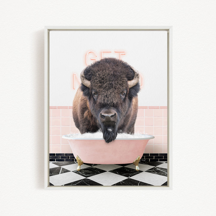 A buffalo with a long beard is sitting in a pink bathtub, with a pink and white checkered floor and a pink wall behind it.