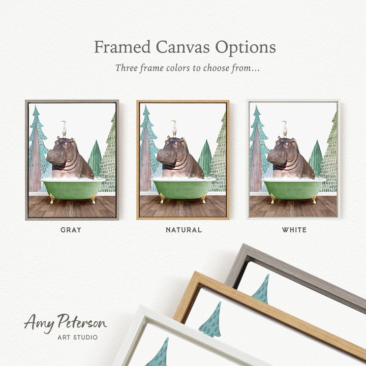The image is a framed canvas option featuring a hippopotamus sitting in a bathtub, with three different frame colors to choose from: gray, natural, and white.