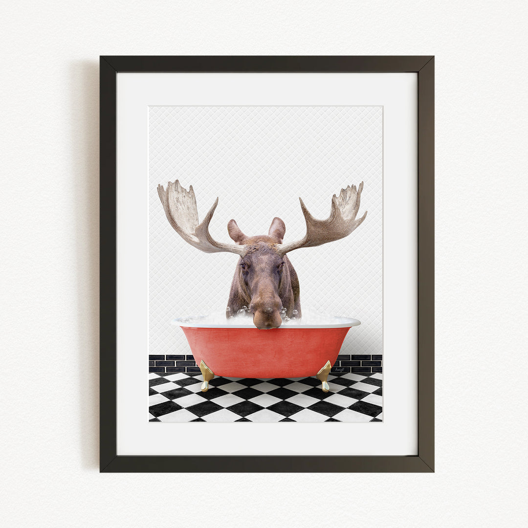 A moose with large antlers is sitting in a red bathtub, surrounded by a black and white checkered floor.