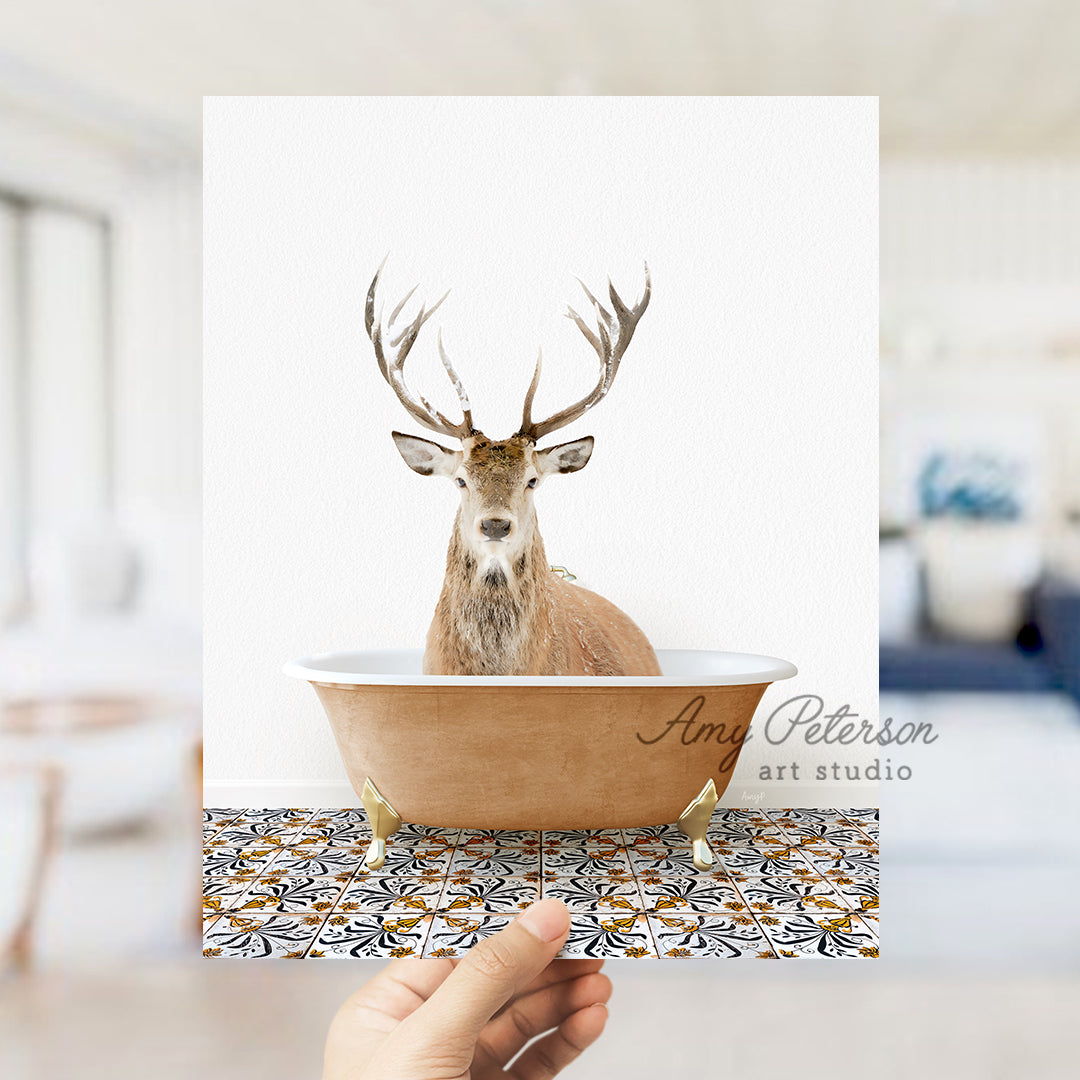 a hand holding a card with a deer in a bathtub