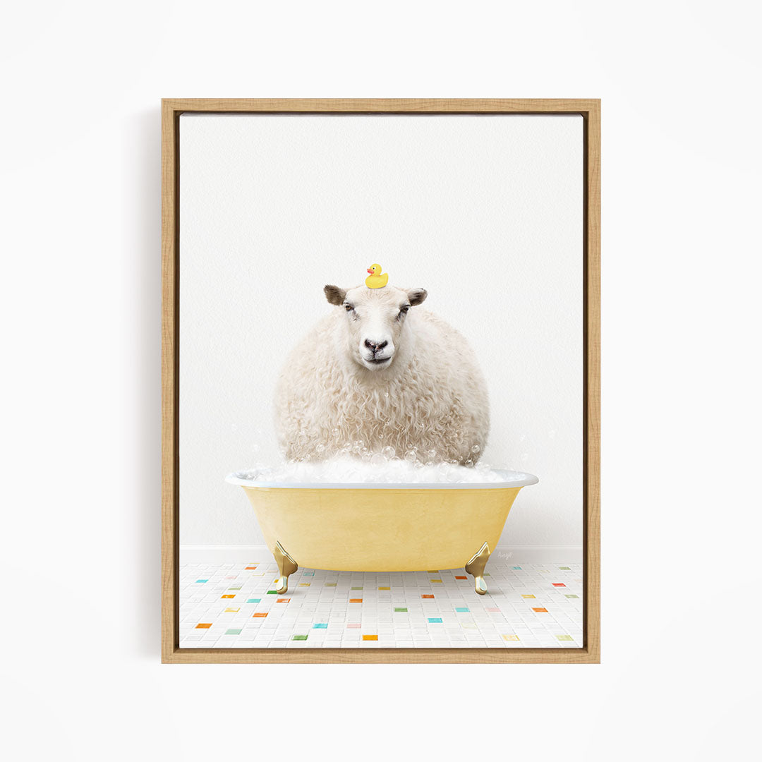A fluffy white sheep sits in a yellow bathtub filled with bubbles, with a yellow rubber duck perched on its head.