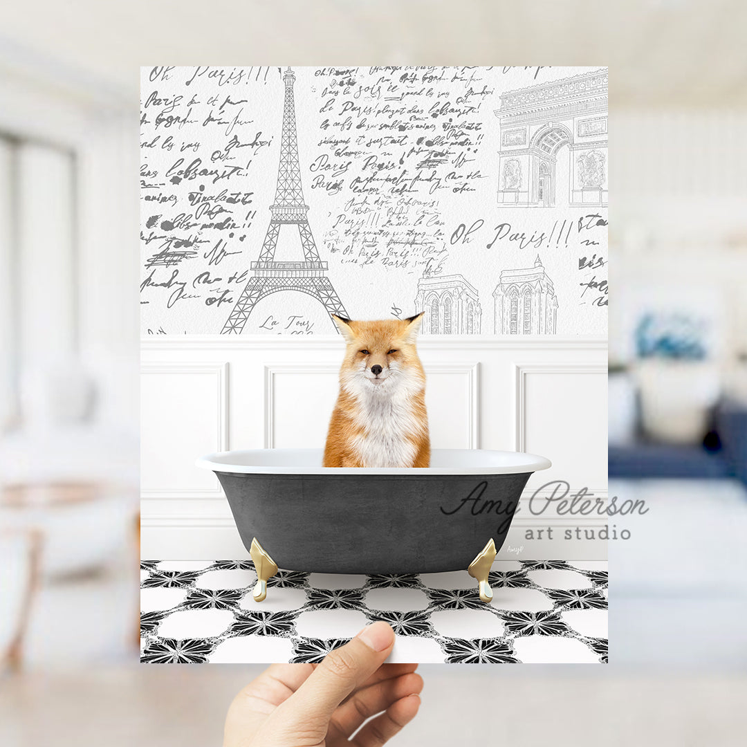 a person holding up a card with a picture of a fox in a bathtub