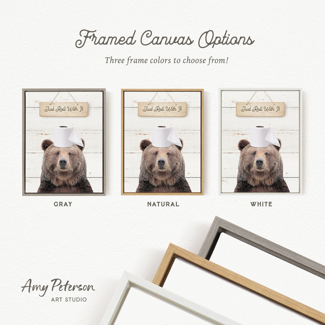 three framed canvas options featuring a bear with a sign on its head, each with a different frame color: gray, natural, and white.