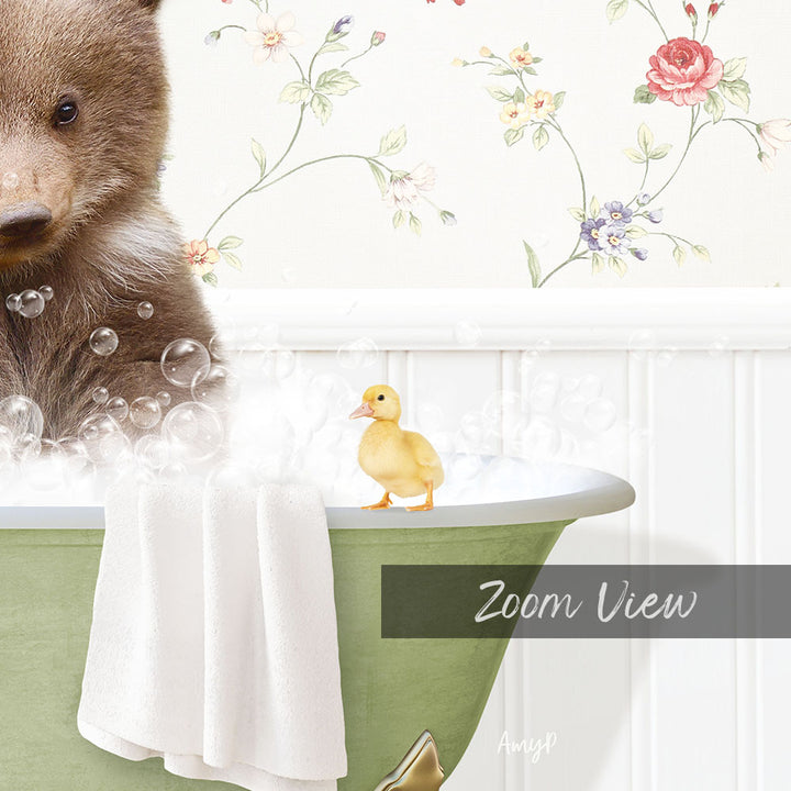 A brown bear is sitting in a bathtub filled with bubbles, with a yellow duck standing on the edge of the tub.