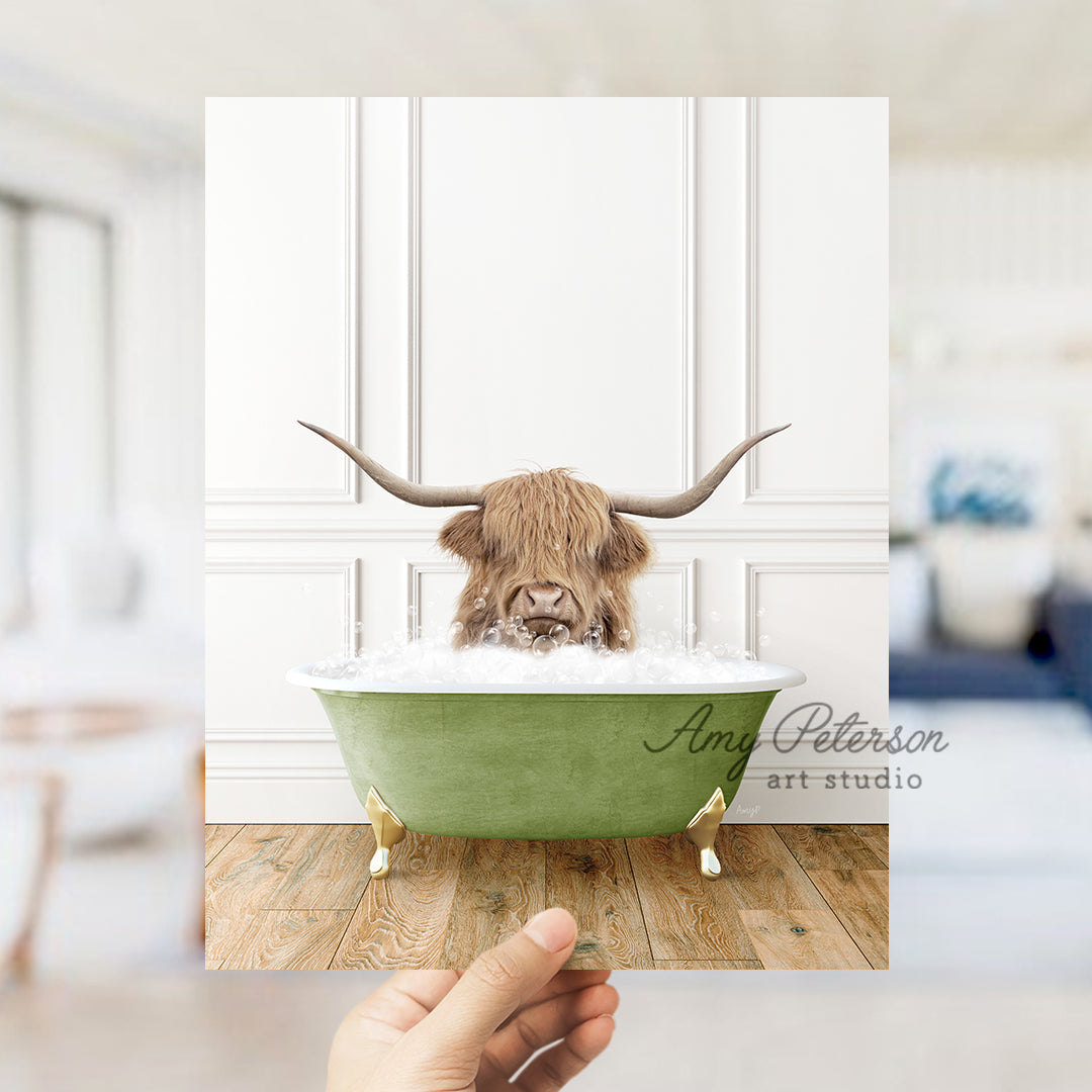 a hand holding a card with a picture of a bull in a bathtub