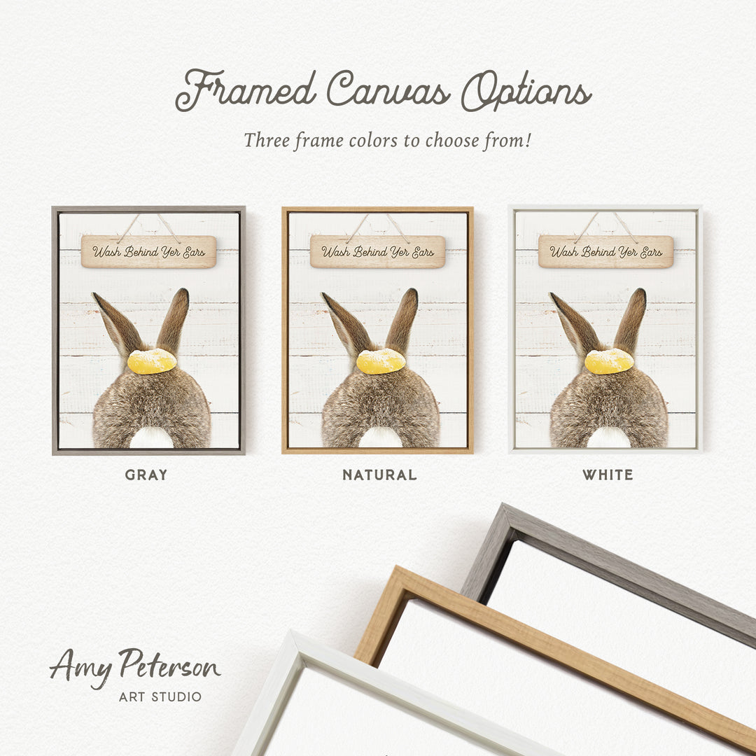 three framed canvas options, each featuring a different color and frame style, including a gray, natural, and white frame.