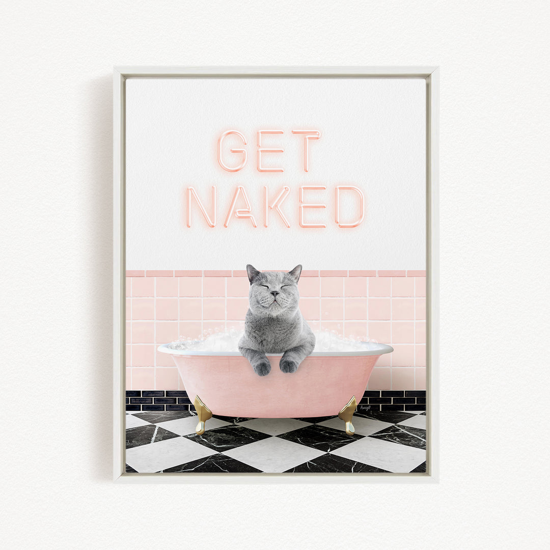A gray cat sitting in a pink bathtub with the text "GET NAKED" displayed above it.