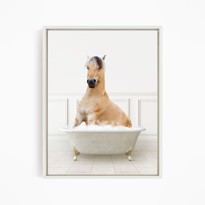 A light brown horse is sitting in a white bathtub filled with water, creating a whimsical and playful scene.