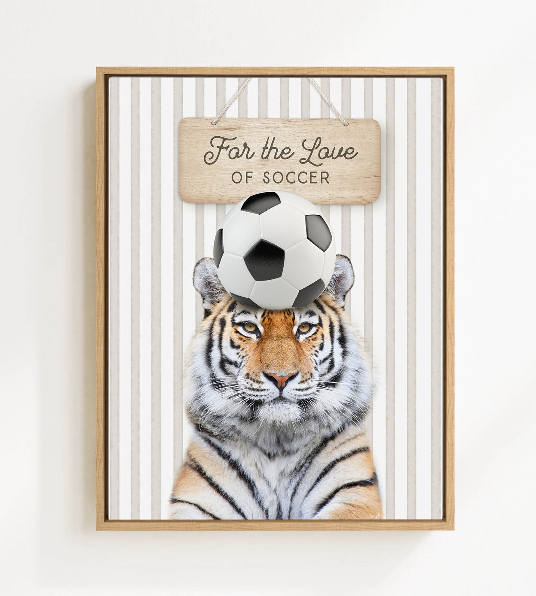 A tiger is standing in front of a sign that says "For the Love of Soccer".