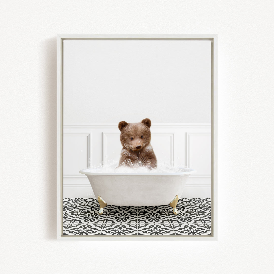 A brown bear sitting in a white bathtub filled with water, surrounded by a black and white patterned floor.