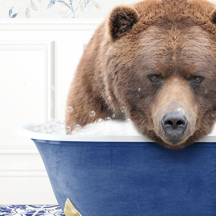 a large brown bear sitting in a bath tub