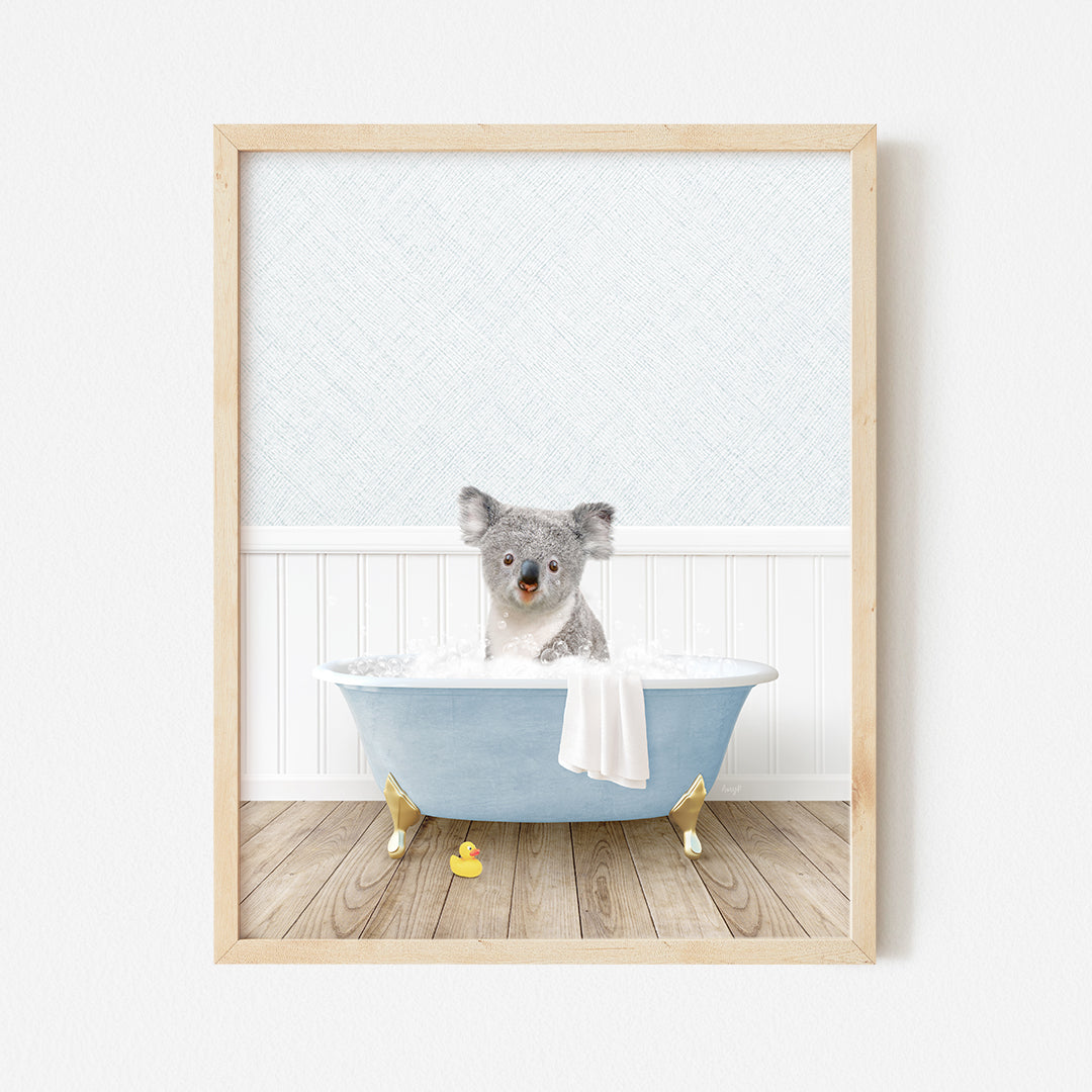 a picture of a koala sitting in a bathtub