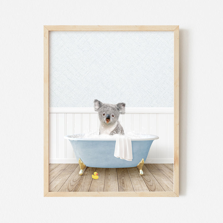 a picture of a koala sitting in a bathtub