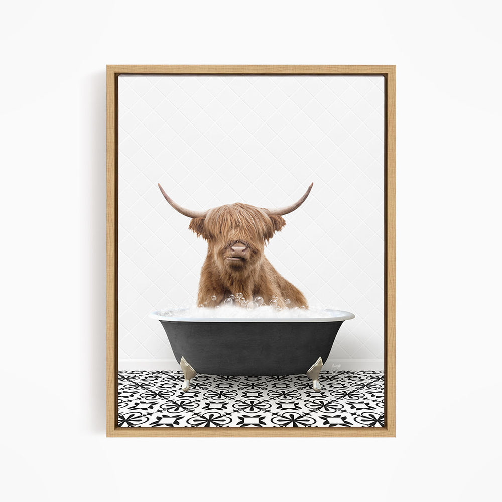 A Highland cow with long horns is sitting in a bathtub filled with water, creating a whimsical and amusing scene.