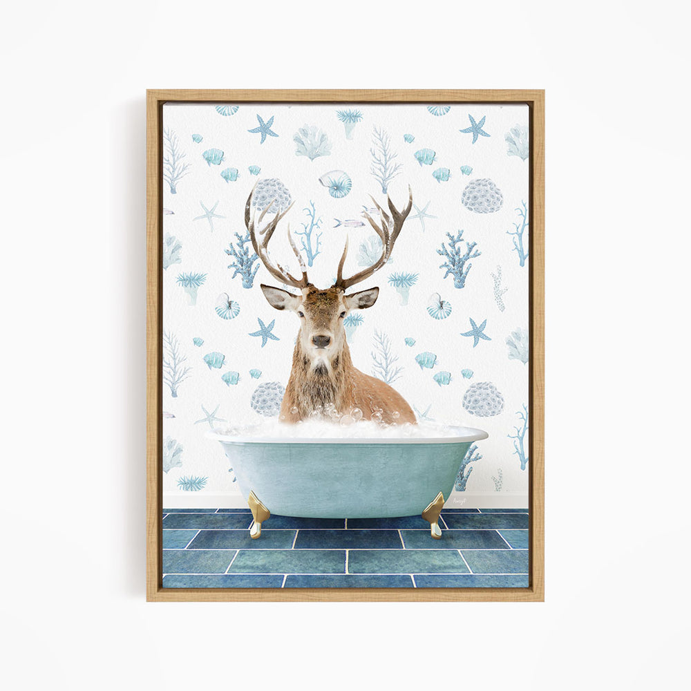 A deer with antlers is sitting in a bathtub filled with bubbles, surrounded by a blue and white patterned background.