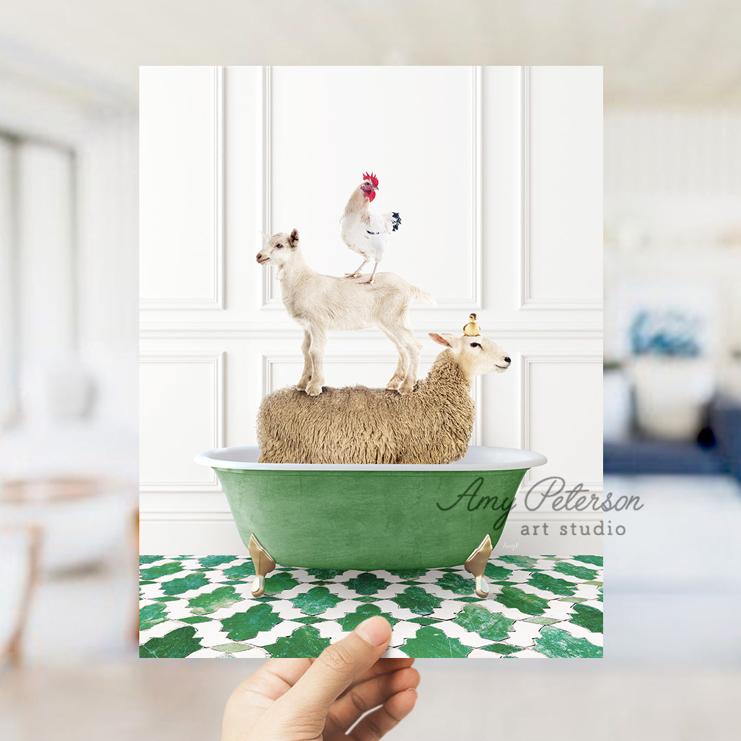 a person holding up a card with a sheep and a chicken on top of a