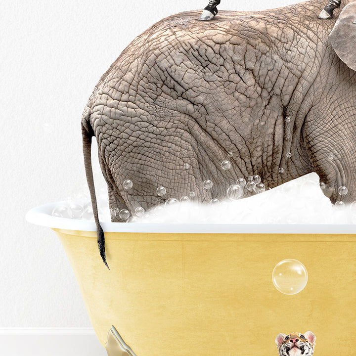 an elephant is taking a bath in a bathtub