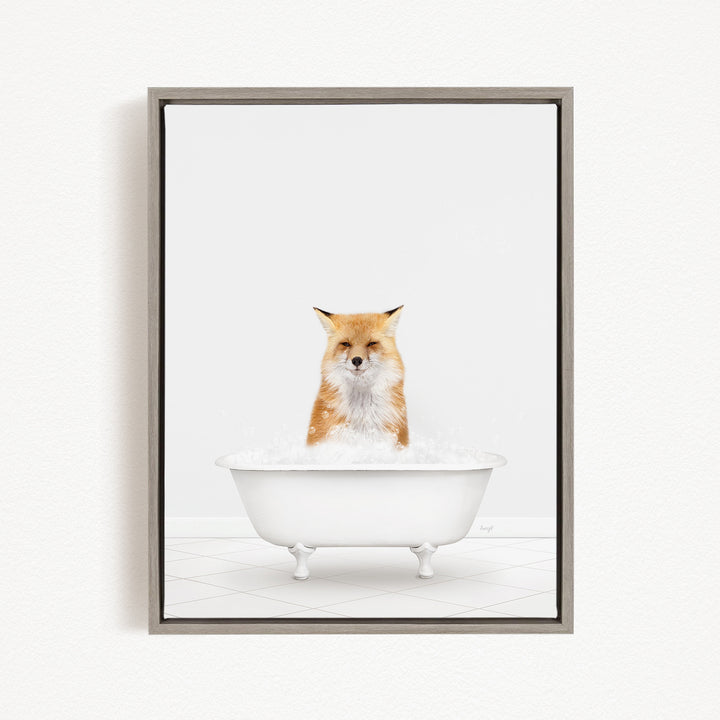 A red fox sitting in a white bathtub filled with bubbles.