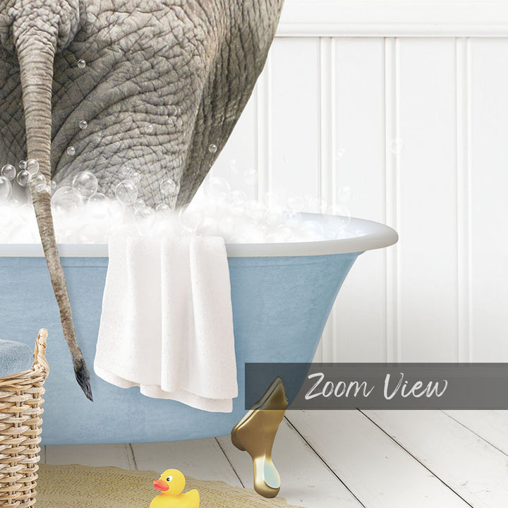A large elephant is taking a bath in a blue tub, surrounded by bubbles and a towel, with a yellow rubber duck nearby.