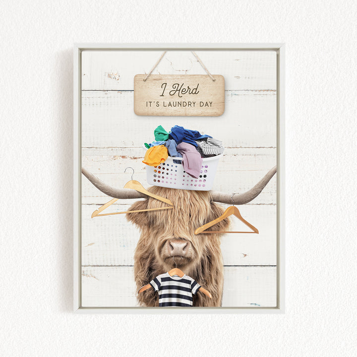 A humorous collage featuring a cow with a basket of laundry on its head, accompanied by a sign that reads "I herd it's laundry day".