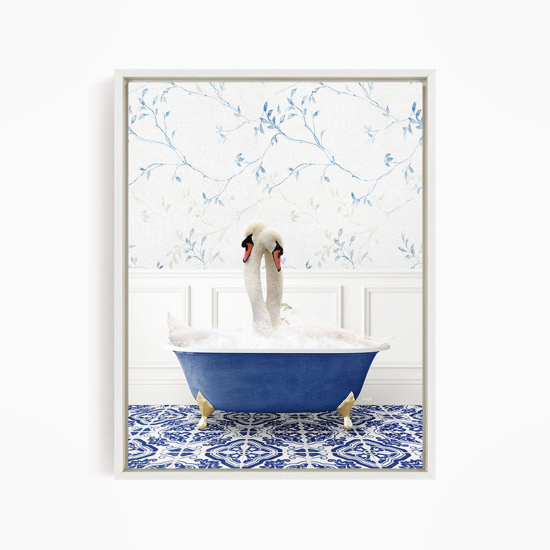 A pair of swans sitting in a blue bathtub, with a patterned tile floor and a floral wallpaper in the background.