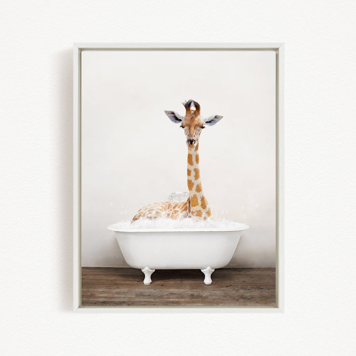 A giraffe is sitting in a white bathtub filled with bubbles, creating a whimsical and playful scene.
