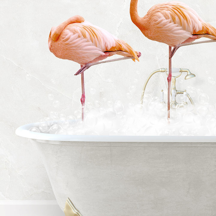 two flamingos standing on legs in a bathtub