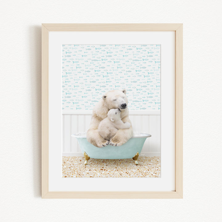 A polar bear and a cub are sitting together in a bathtub, with the polar bear appearing to be hugging the cub.